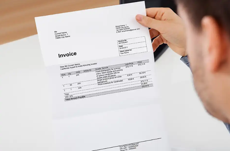 Man Holding a invoice